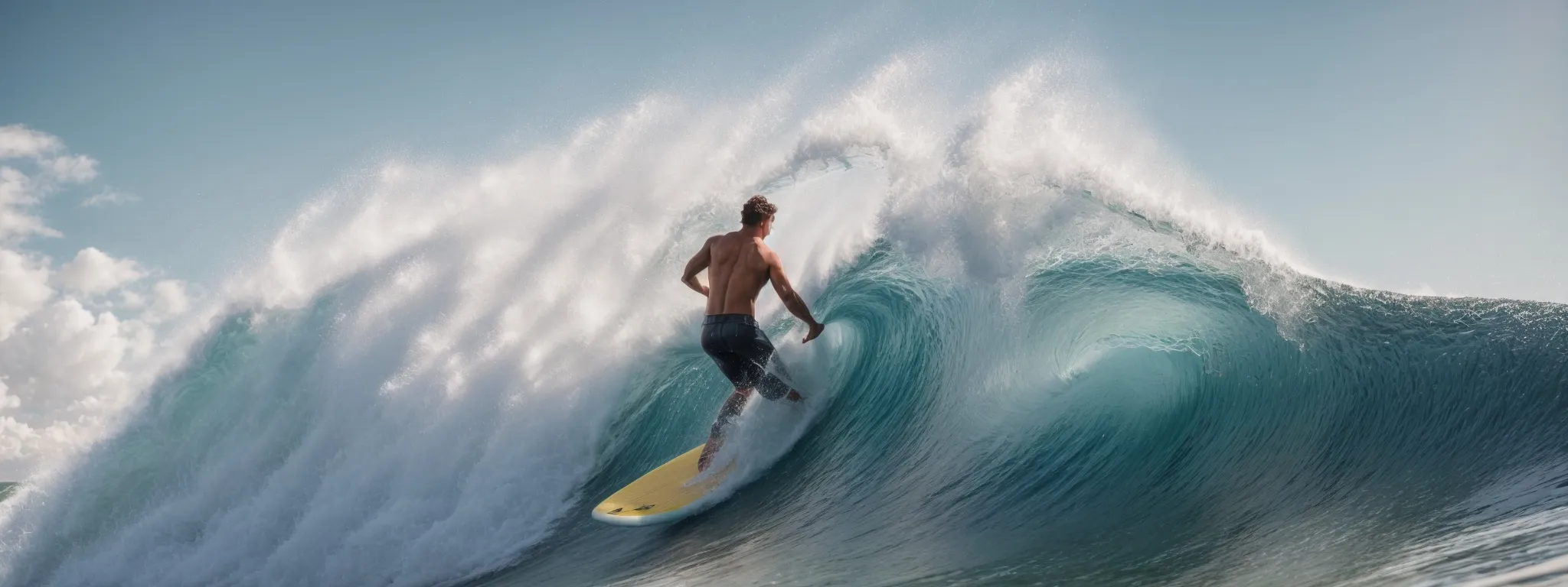 a blogger surfs a giant wave symbolizing keyword trends on a computer mouse-shaped surfboard.