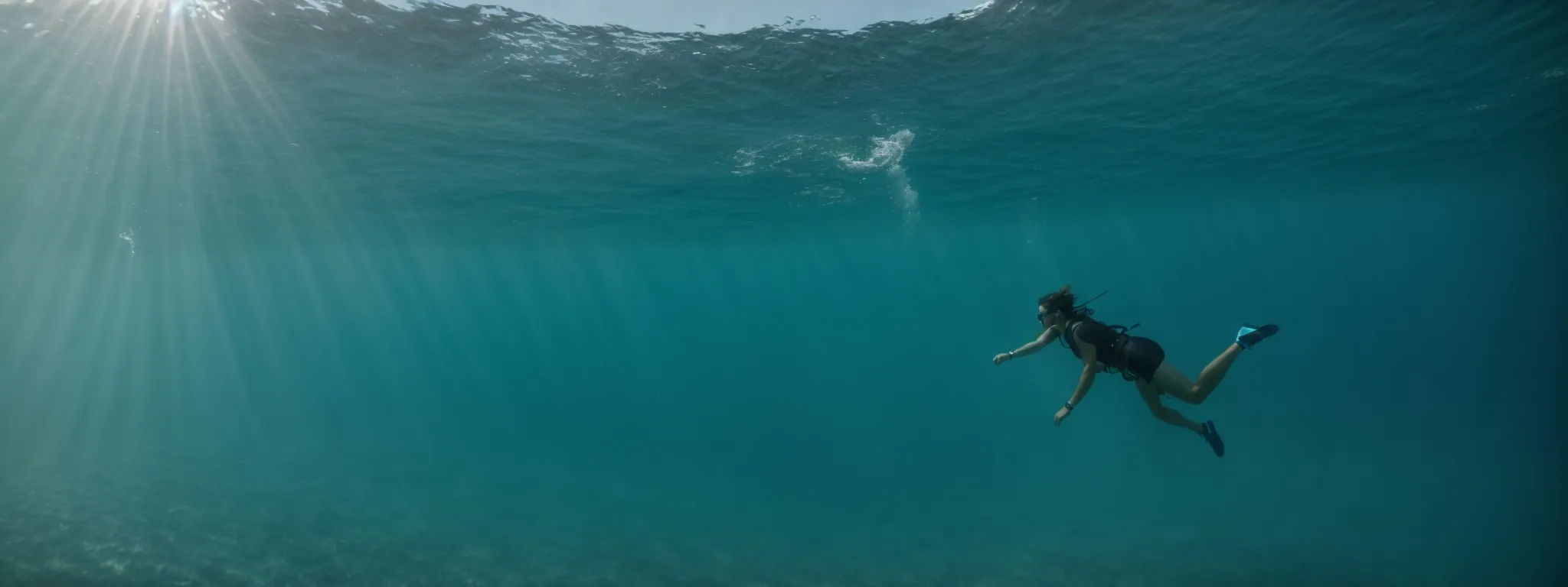 a person diving into a calm ocean, symbolizing the exploration of keyword metrics.