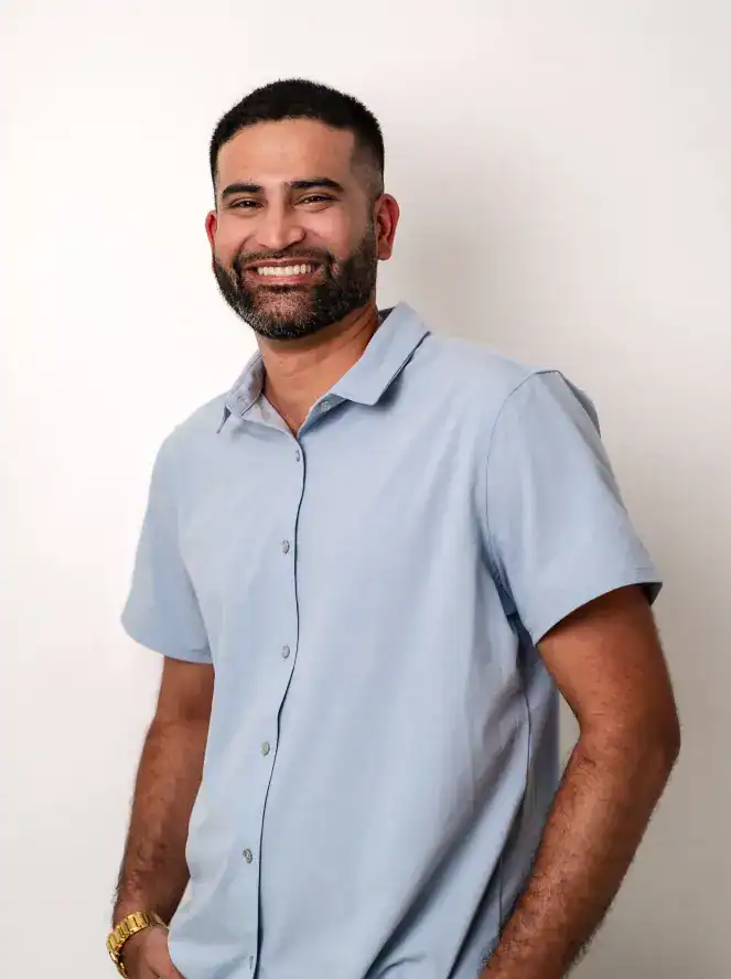 Man smiling with confident expression, showcasing SEO tools.